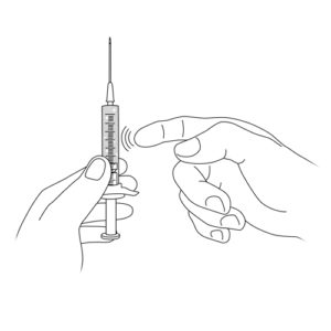 489.Hands that expel air bubbles from a needle syringe.FINAL